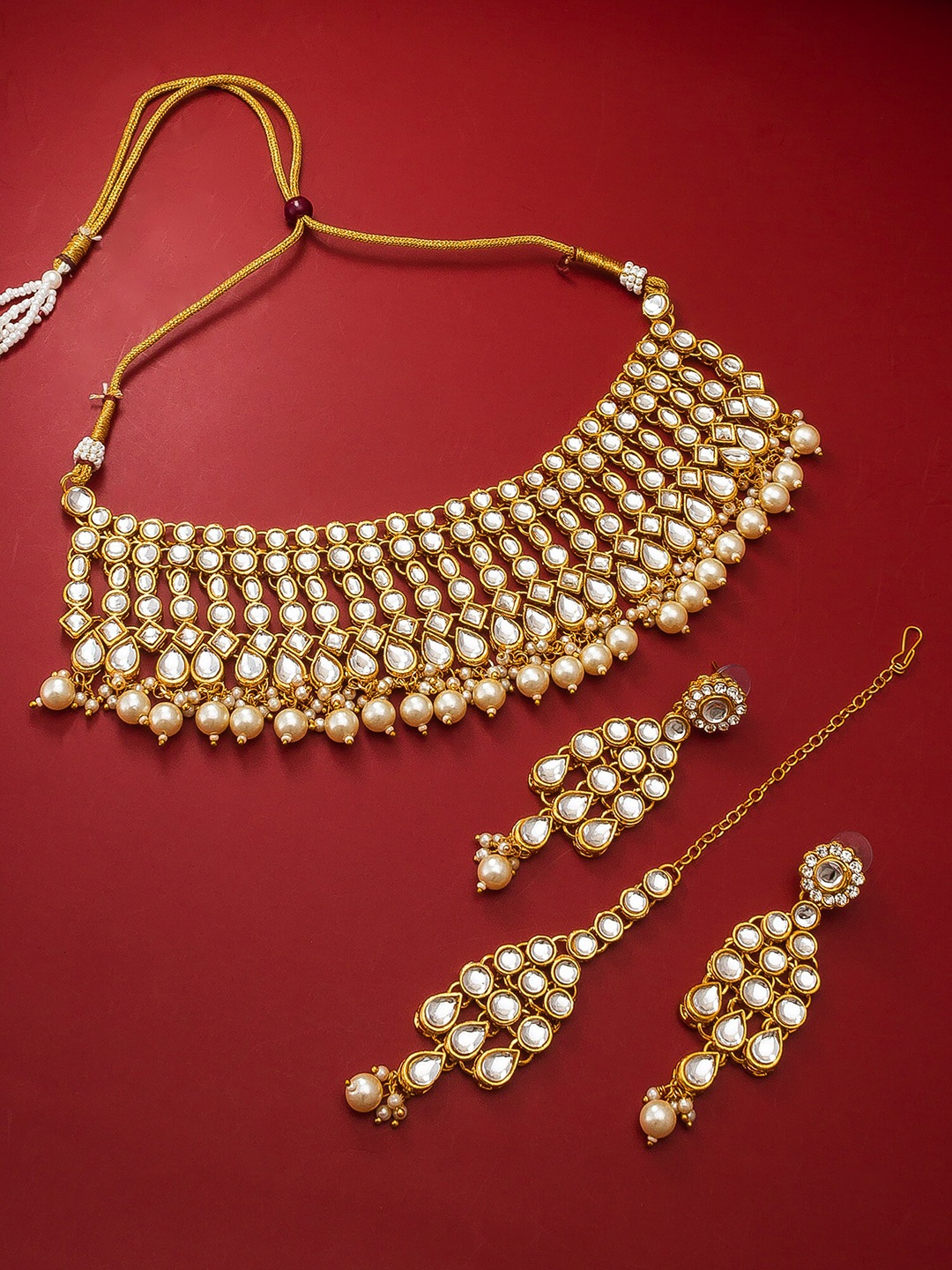 

aadita Gold-Plated White Kundan Studded & Beaded Handcrafted Jewellery Set