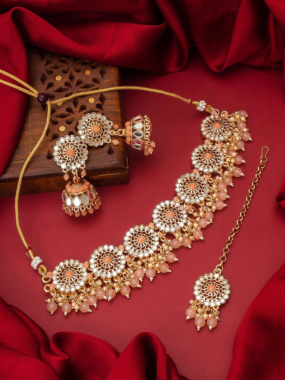 

aadita Gold-Plated Orange & White Stone-Studded & Pearl Beaded Handcrafted Jewellery Set