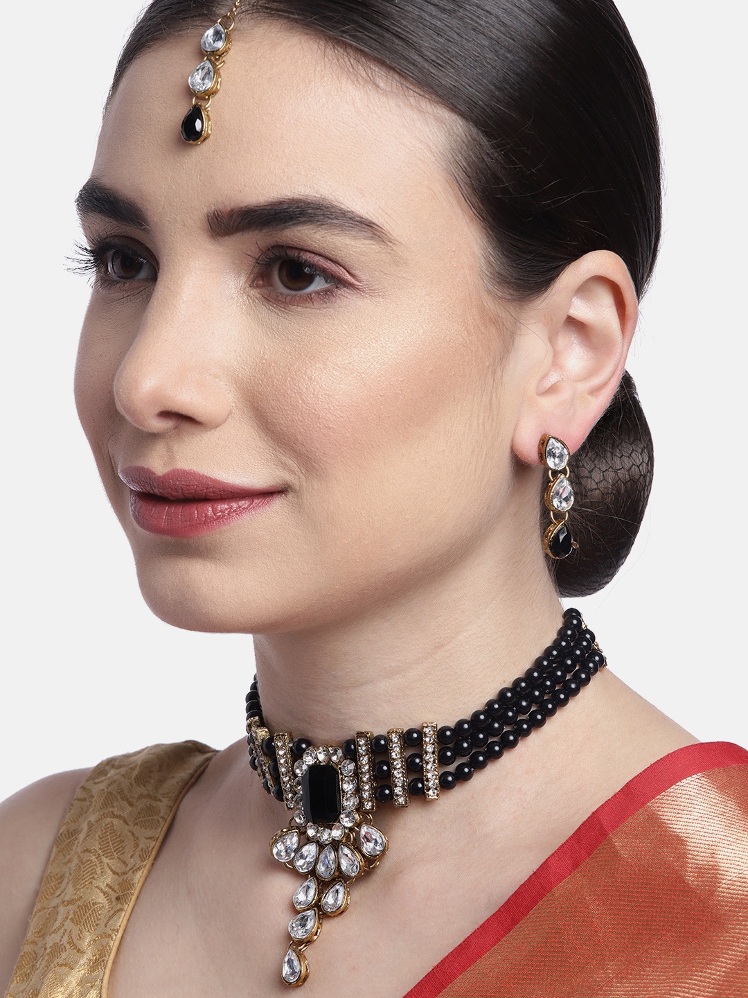 

Anouk Black Gold-Plated Stone-Studded & Beaded Jewellery Set with Maang Tika