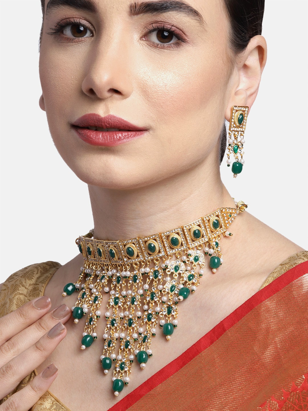 

Anouk Green Gold-Plated Stone-Studded & Beaded Rajputana Jewellery Set