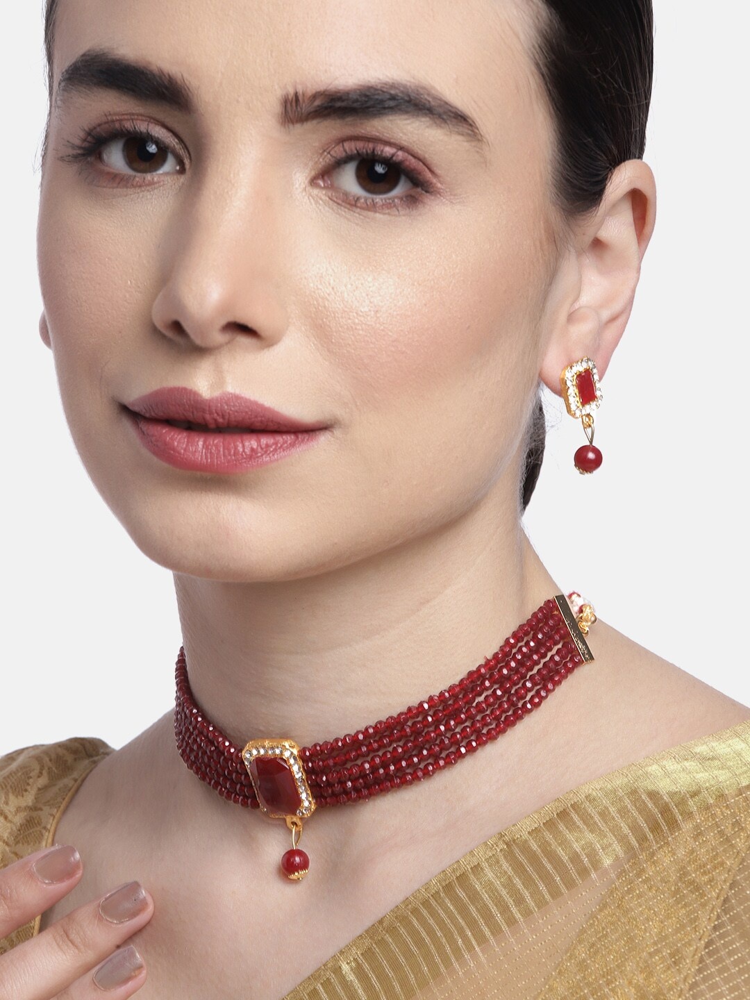 

Anouk Maroon Gold-Plated Stone Studded & Beaded Rajputana Jewellery Set
