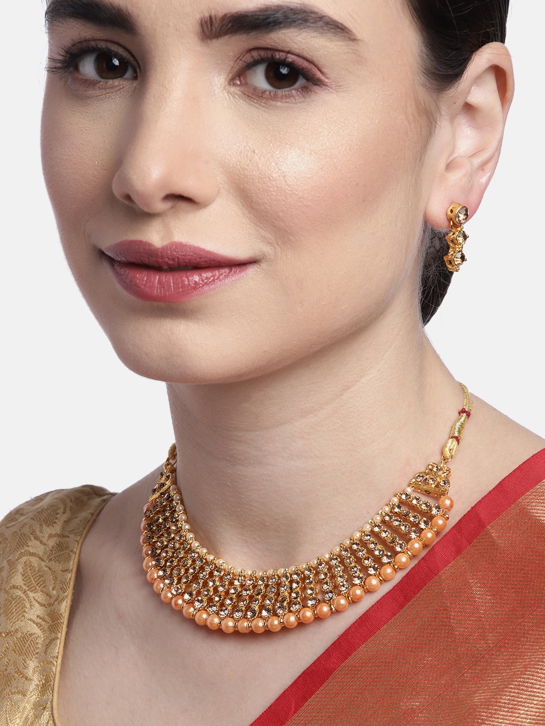 

Anouk Peach-Coloured Gold-Plated Stone-Studded & Beaded Traditional Jewellery Set