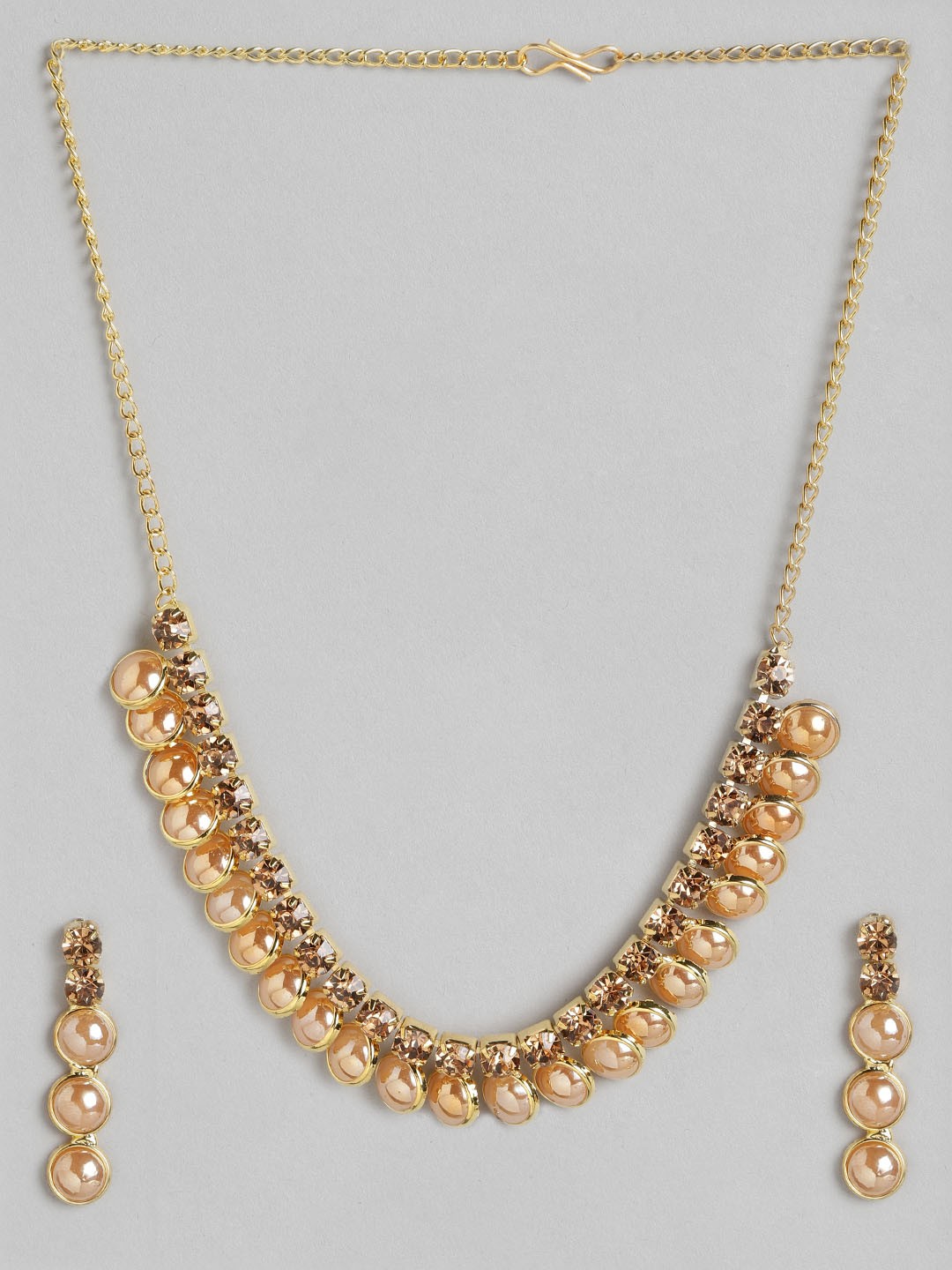

Anouk Off-White Gold-Plated Beaded Stone-Studded Jewellery Set