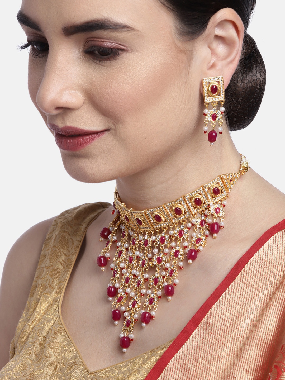 

Anouk Red & White Gold-Plated Stone-Studded & Beaded Traditional Jewellery Set