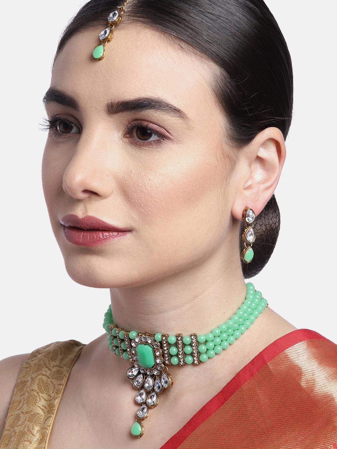 

Anouk Sea Green Gold-Plated Stone-Studded & Beaded Jewellery Set with Maang Tika