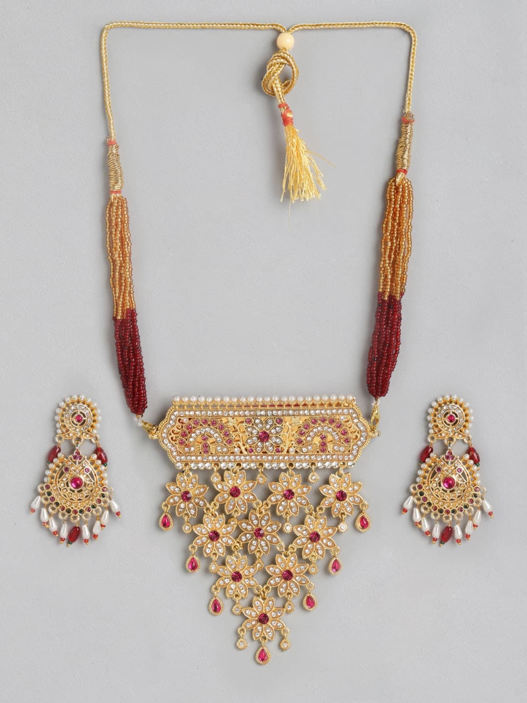 

Anouk Maroon Gold-Plated Stone-Studded & Beaded Jewellery Set