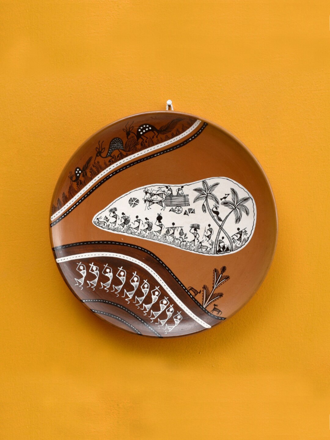

AAKRITI ART CREATIONS Brown & White Handpainted Warli Earthen Plate Wall Decor
