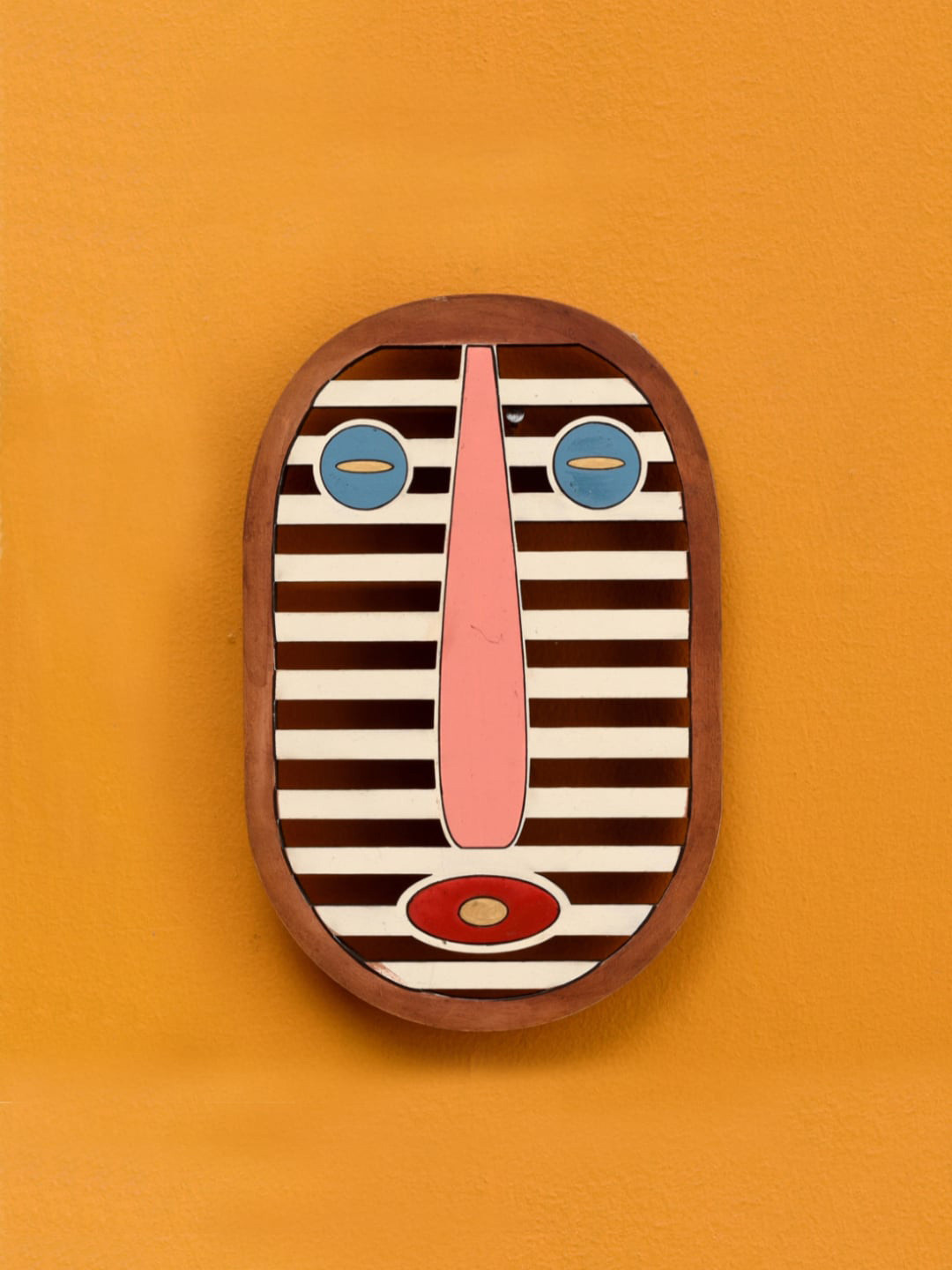 

AAKRITI ART CREATIONS Brown & Cream-Coloured Abstarct Patterned Tiki Mask Wall Decor