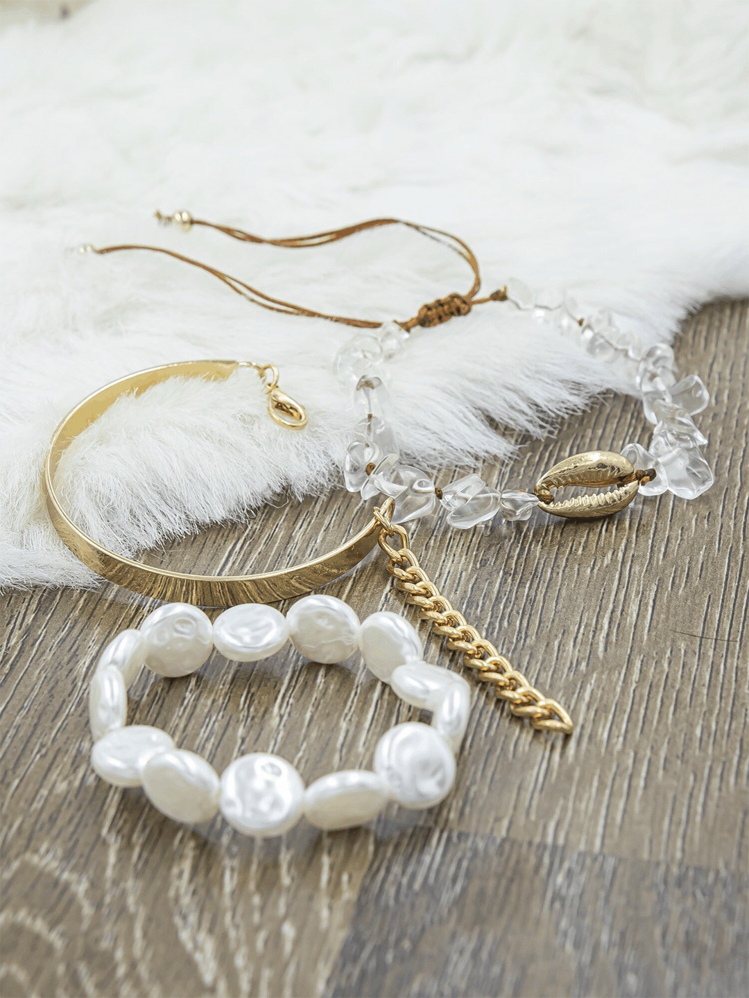 

Bellofox Women Set of 3 Gold-Toned & White Bracelets