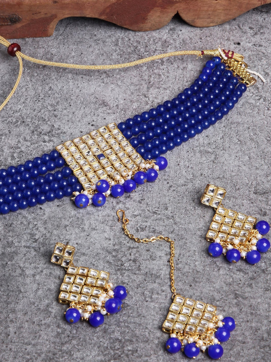 

KARATCART Gold-Plated White Kundan-Studded & Blue Beaded Handcrafted Jewellery Set