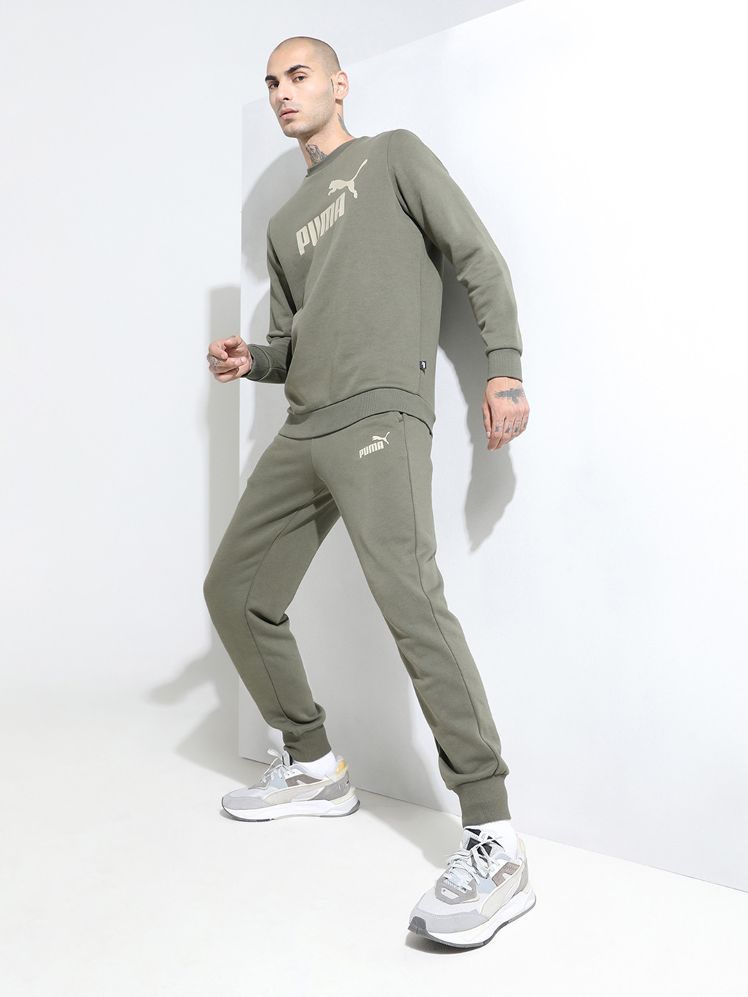 

Puma Men Olive Green Regular Fit Knitted Track Pants
