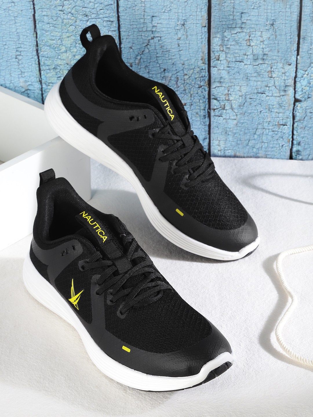 

Nautica Men Black Woven Design Sneakers