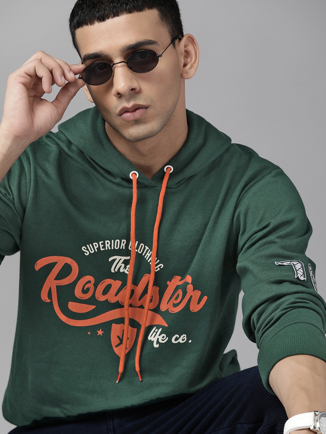 

The Roadster Lifestyle Co. Men Green & Rust Orange Brand Logo Printed Hooded Sweatshirt