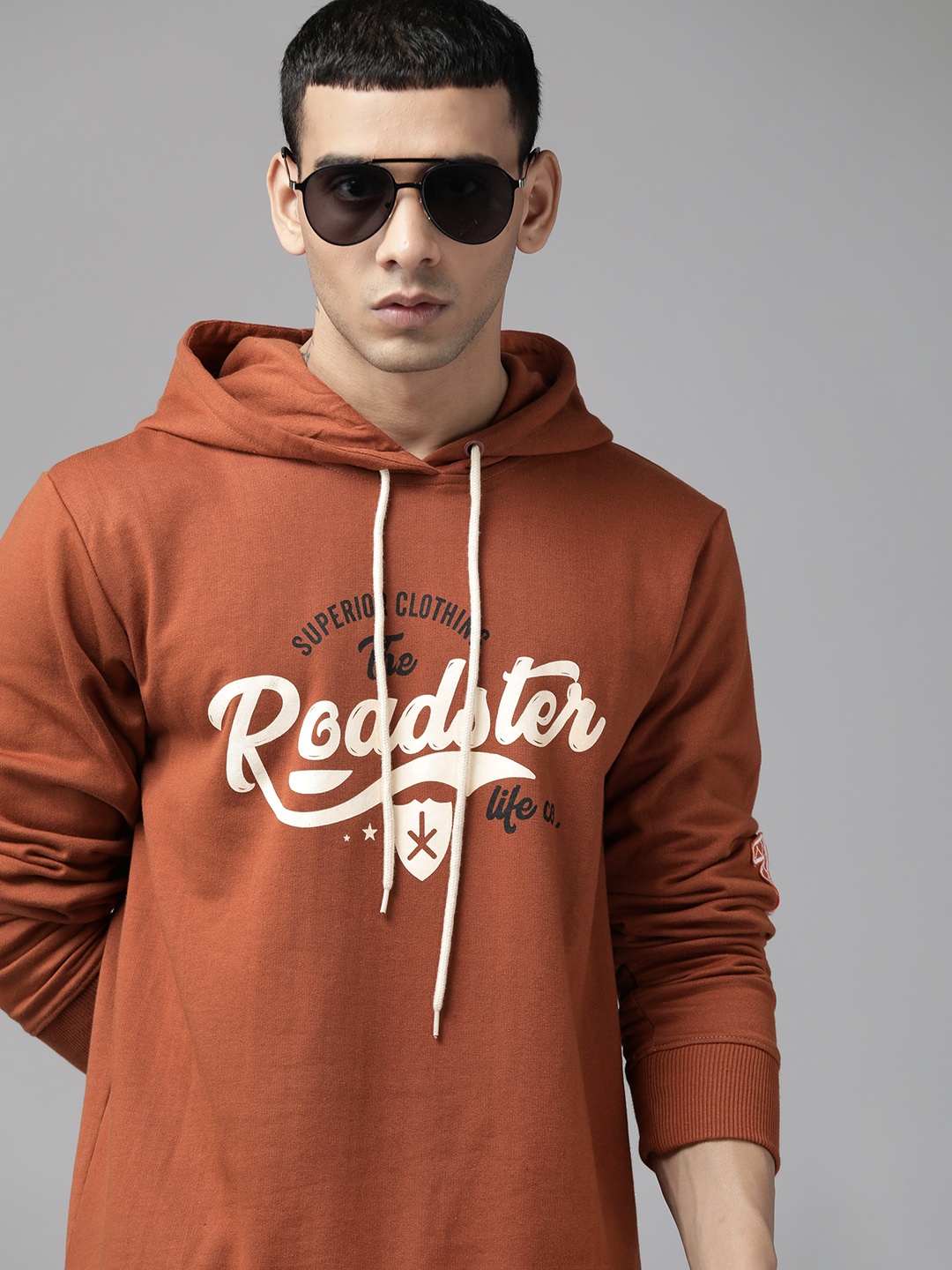 

The Roadster Lifestyle Co. Men Rust Orange Printed Hooded Sweatshirt