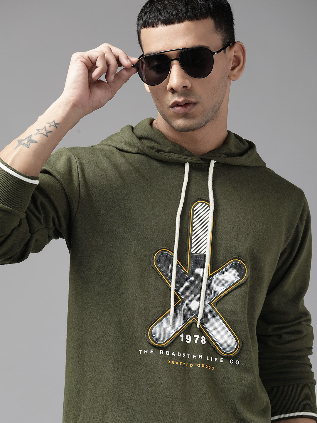 

The Roadster Lifestyle Co. Men Olive Green & White Printed Hooded Sweatshirt