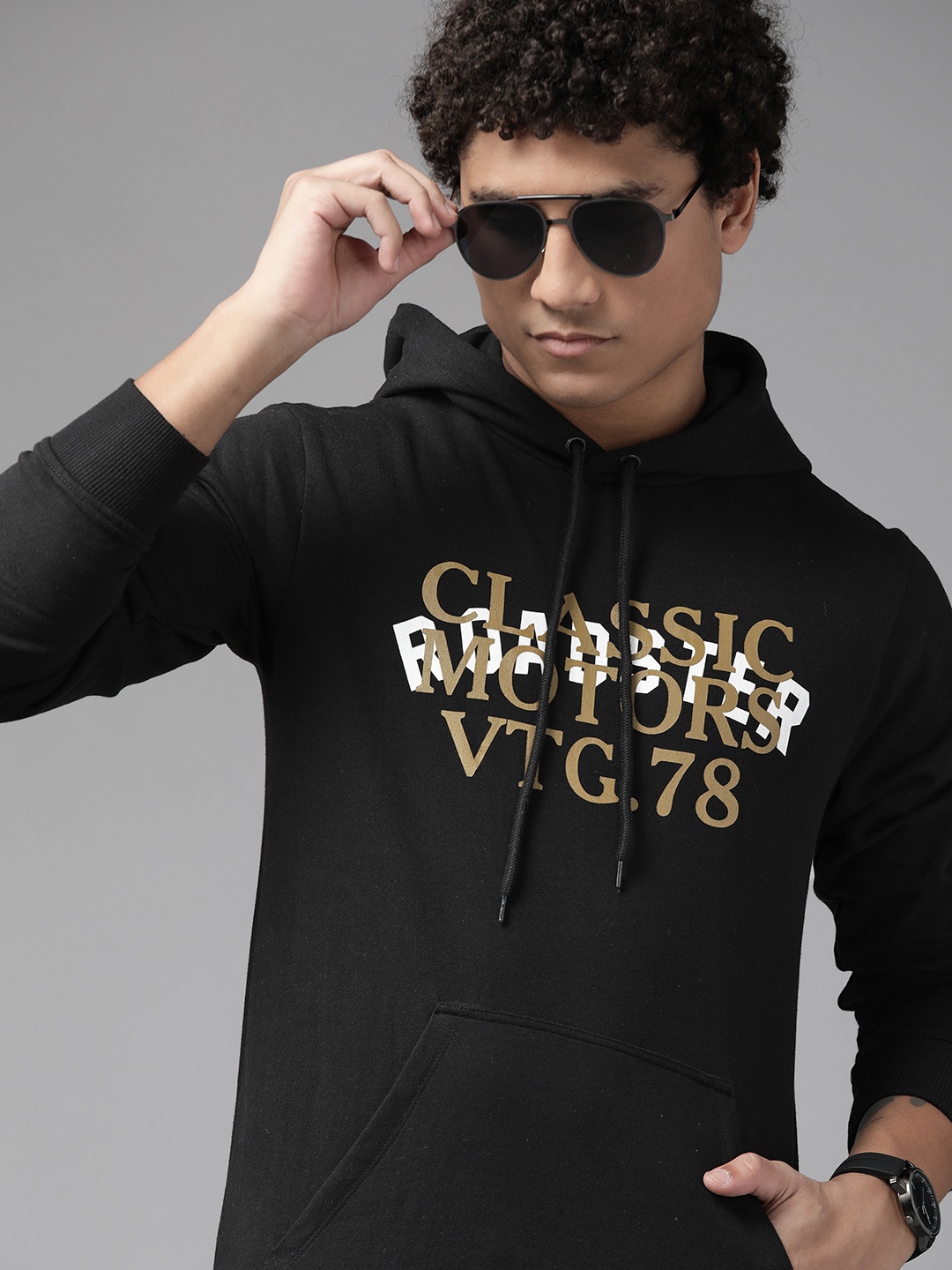 

The Roadster Lifestyle Co. Men Black & Green Brand Logo Printed Hooded Sweatshirt