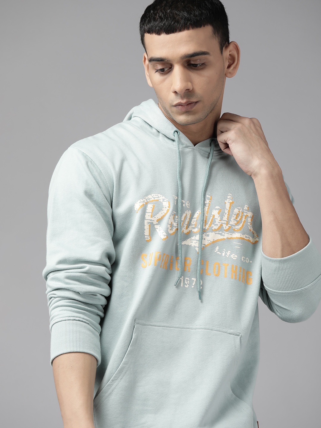

The Roadster Lifestyle Co. Men Blue Brand Logo Printed Hooded Sweatshirt