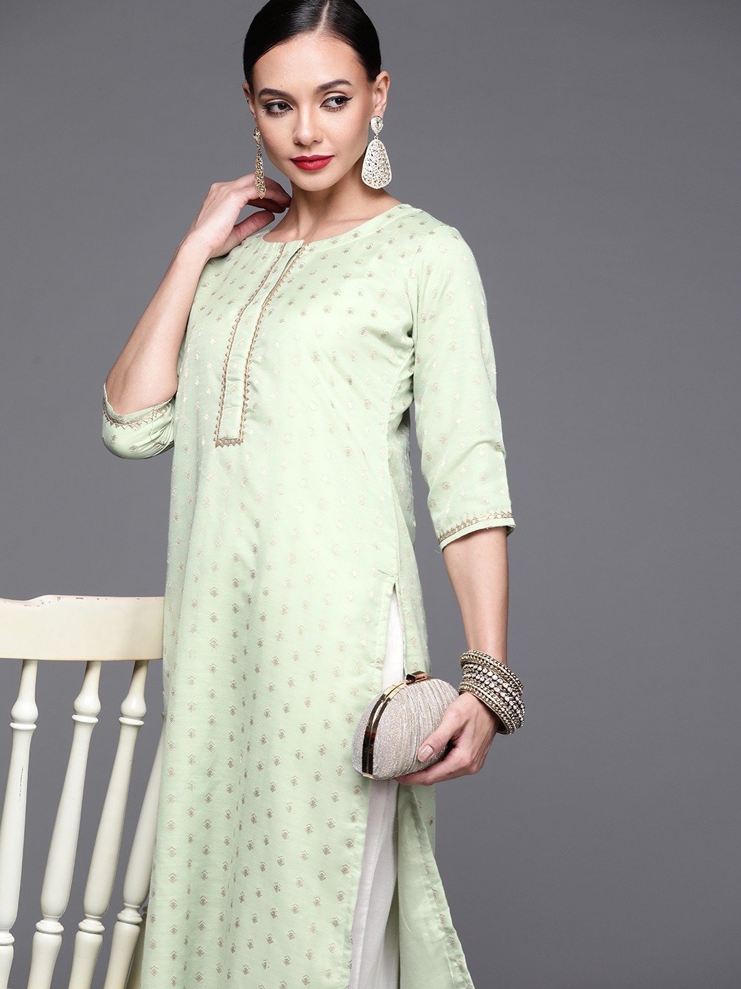 

Libas Women Green & Golden Ethnic Motifs Woven Design Straight Kurta