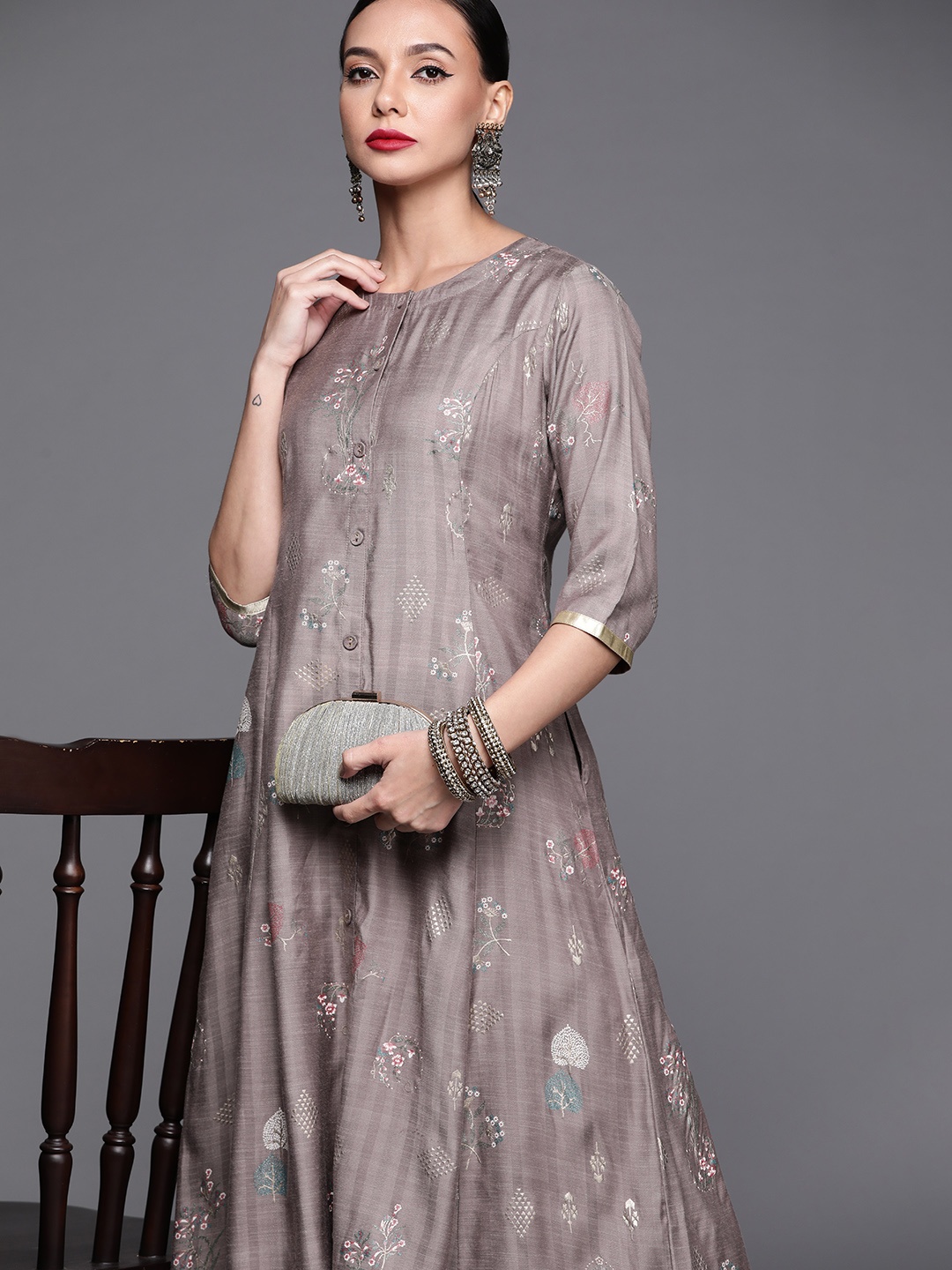 

Libas Women Grey & Golden Floral Motifs Printed A-line Kurta with Pocket