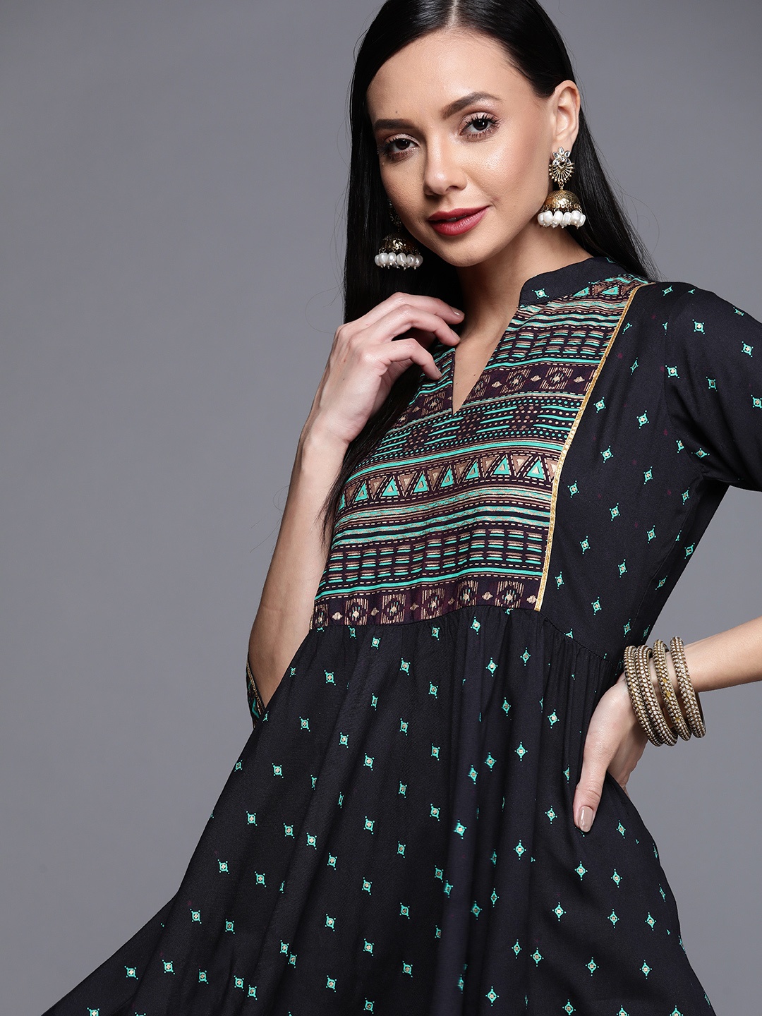 

Libas Women Navy Blue & Golden Ethnic Motifs Print A-line Kurta