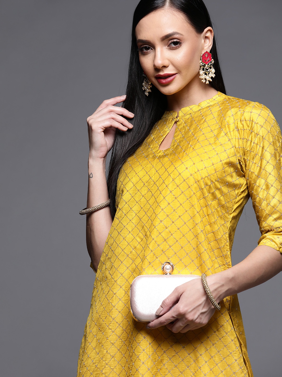 

Libas Women Yellow & Golden Ethnic Motifs Printed Keyhole Neck Straight Kurta
