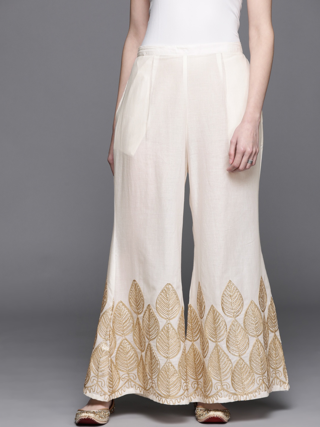 

Libas Women White & Golden Hem Design Cotton Flared Palazzos