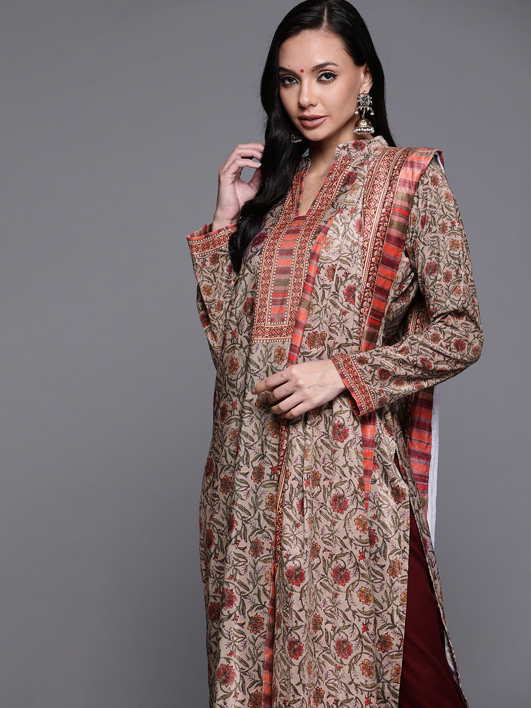 

Libas Women Peach-Coloured Floral Printed Regular Velvet Kurta with Palazzos & With Dupatta