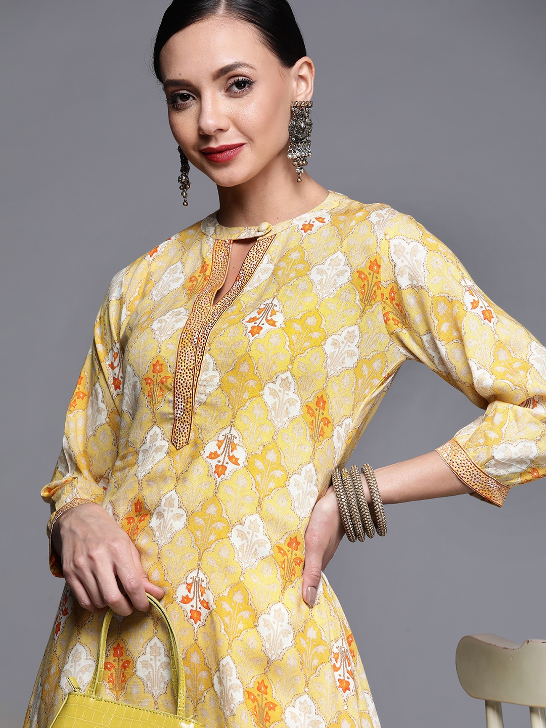 

Libas Women Yellow & Off White Ethnic Motifs Printed Kurta