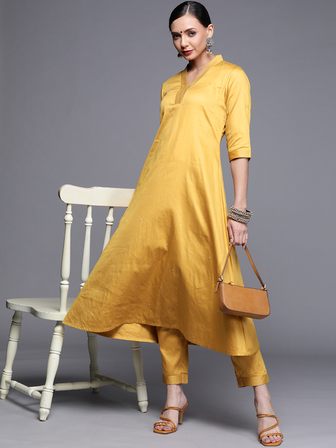 

Libas Women Mustard Yellow Embellished A-Line Kurta