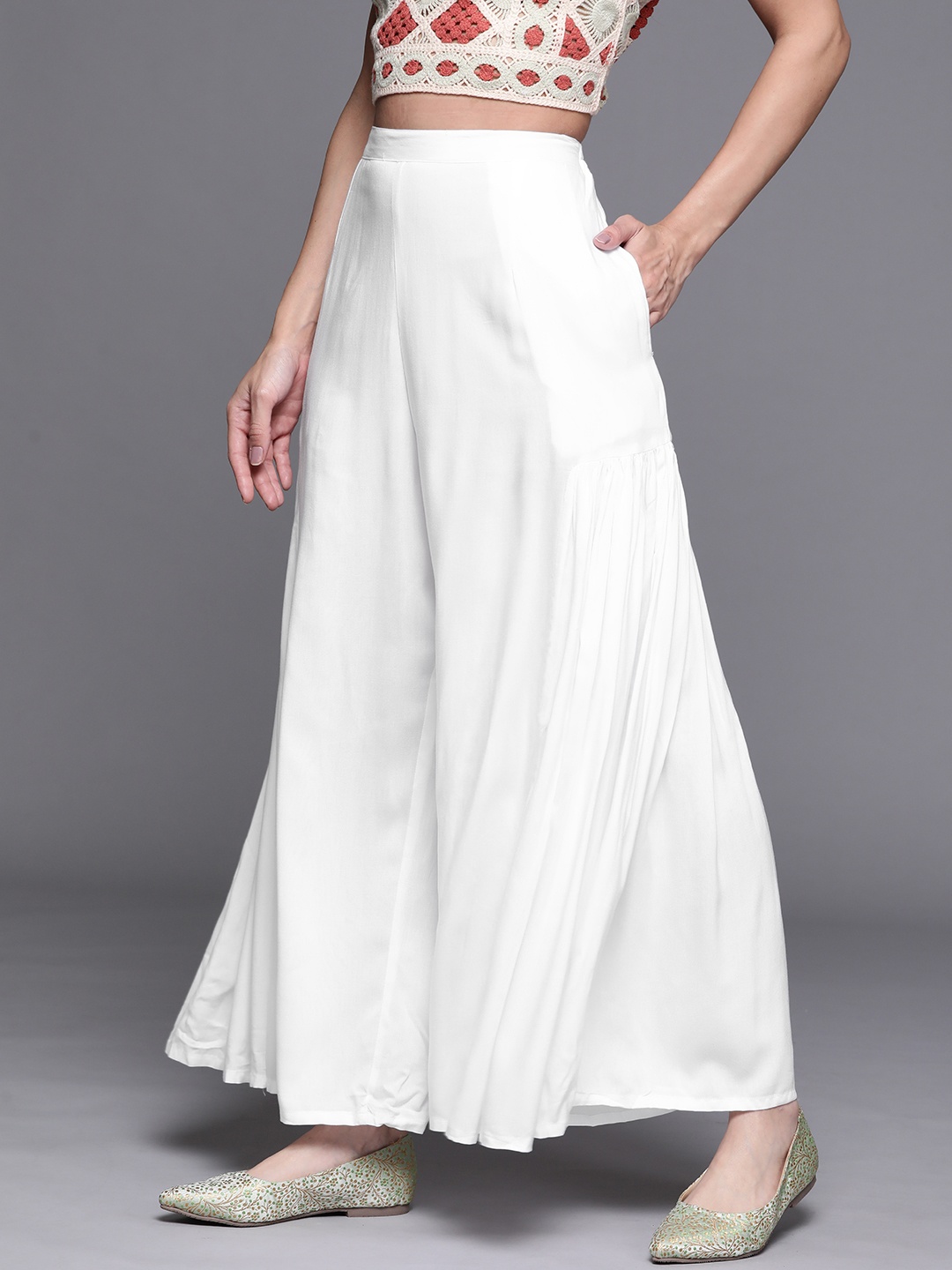 

Libas Women White Solid Side Gathered Flared Palazzos