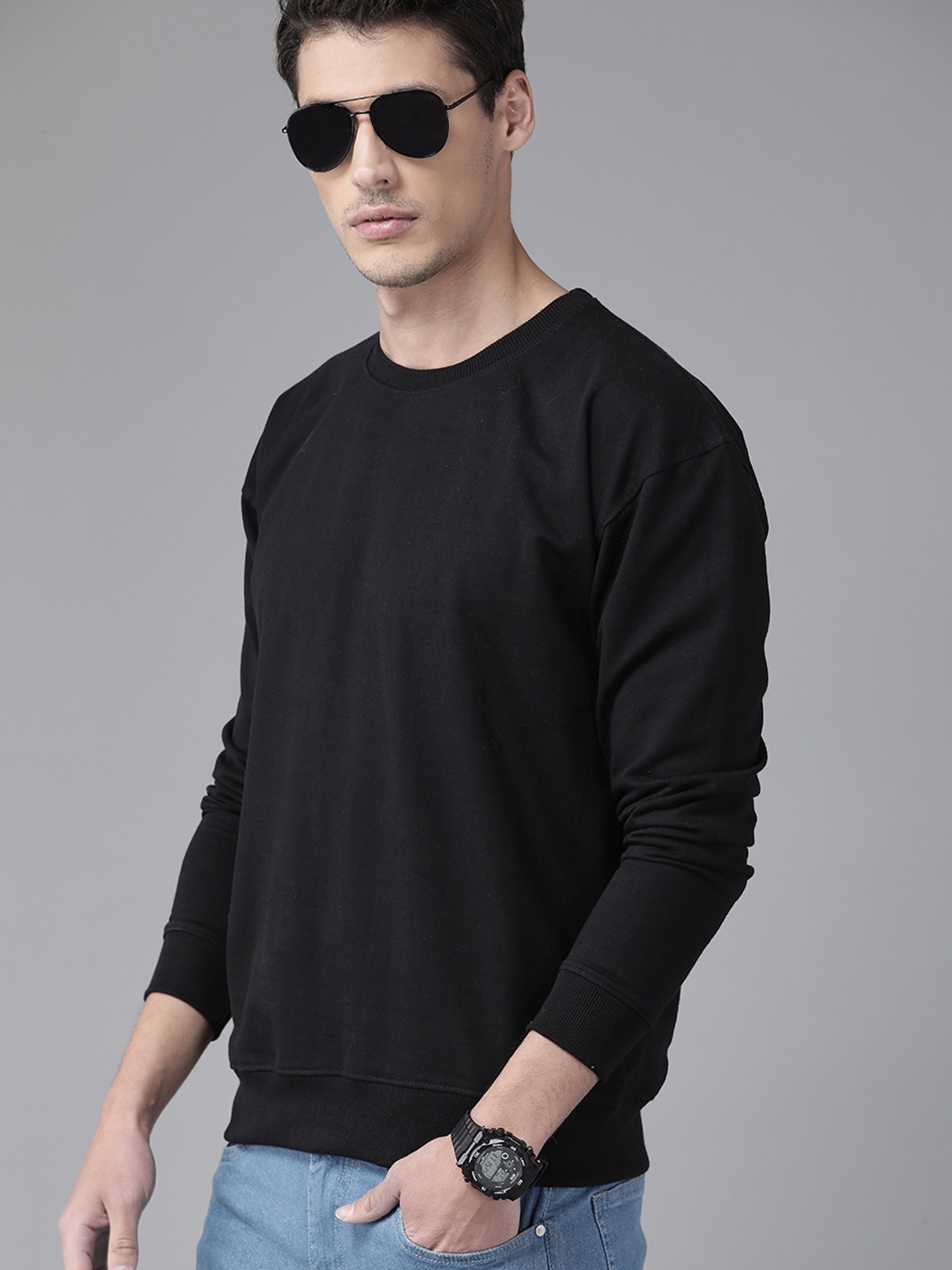 

The Roadster Lifestyle Co Men Black Solid Relaxed Fit Sweatshirt