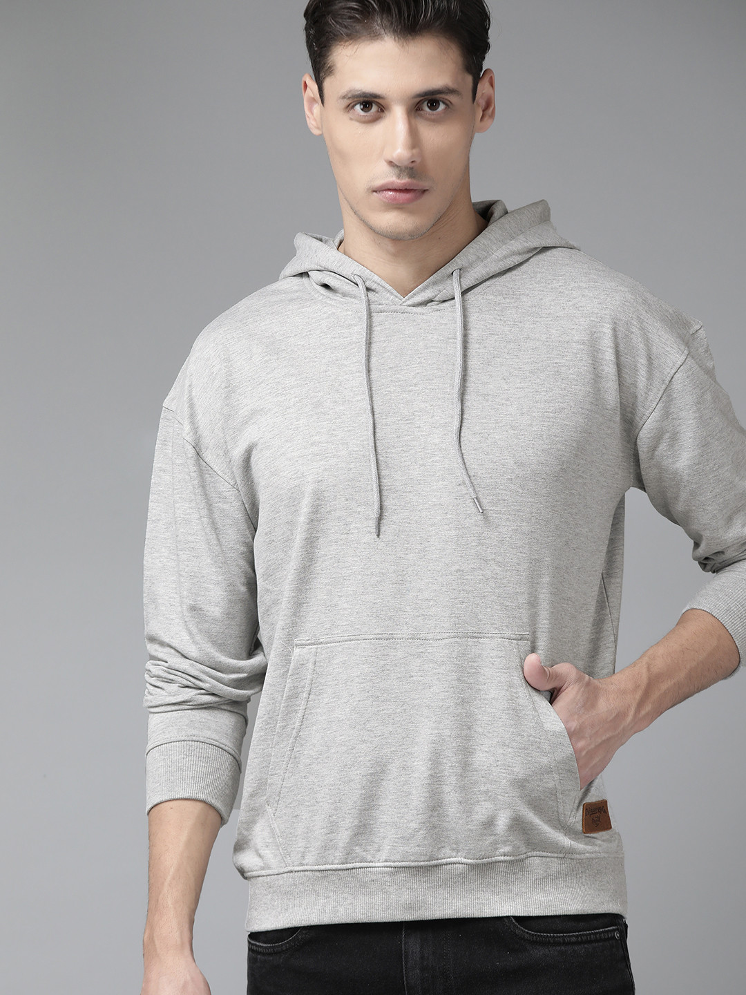 

The Roadster Lifestyle Co Men Grey Melange Solid Hooded Relaxed Fit Sweatshirt