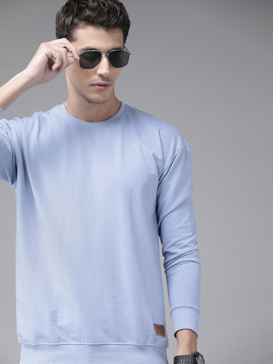 

The Roadster Lifestyle Co Men Blue Solid Relaxed Fit Sweatshirt