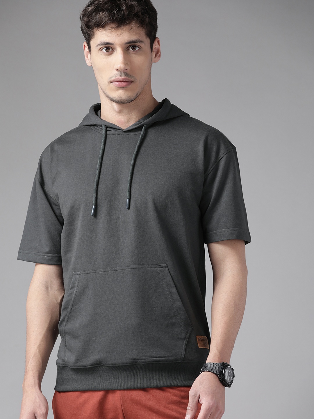 

The Roadster Lifestyle Co Men Charcoal Grey Solid Hooded Relaxed Fit Sweatshirt