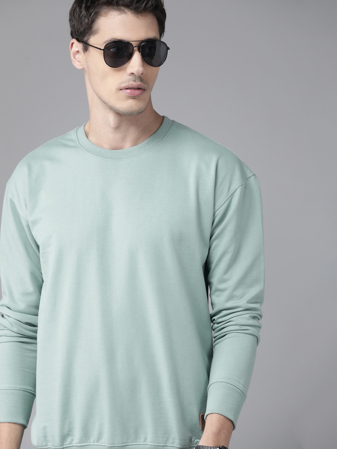 

The Roadster Lifestyle Co Men Blue Solid Relaxed Fit Sweatshirt