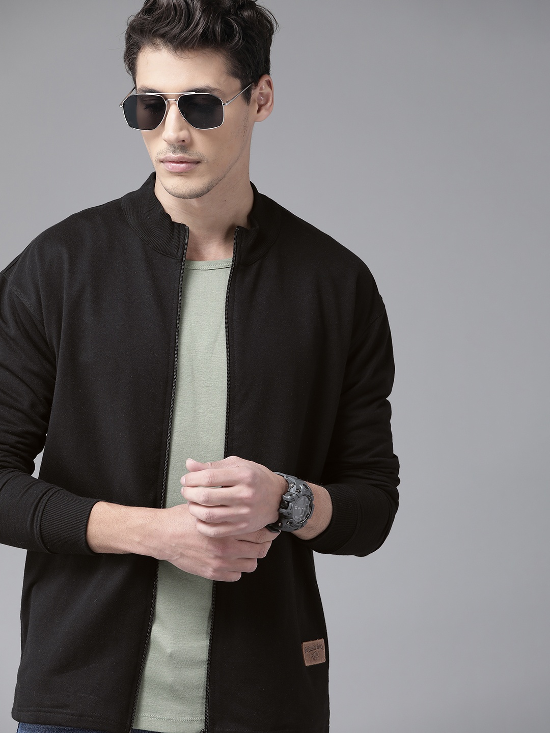 

The Roadster Lifestyle Co Men Black Solid Relaxed Fit Sweatshirt