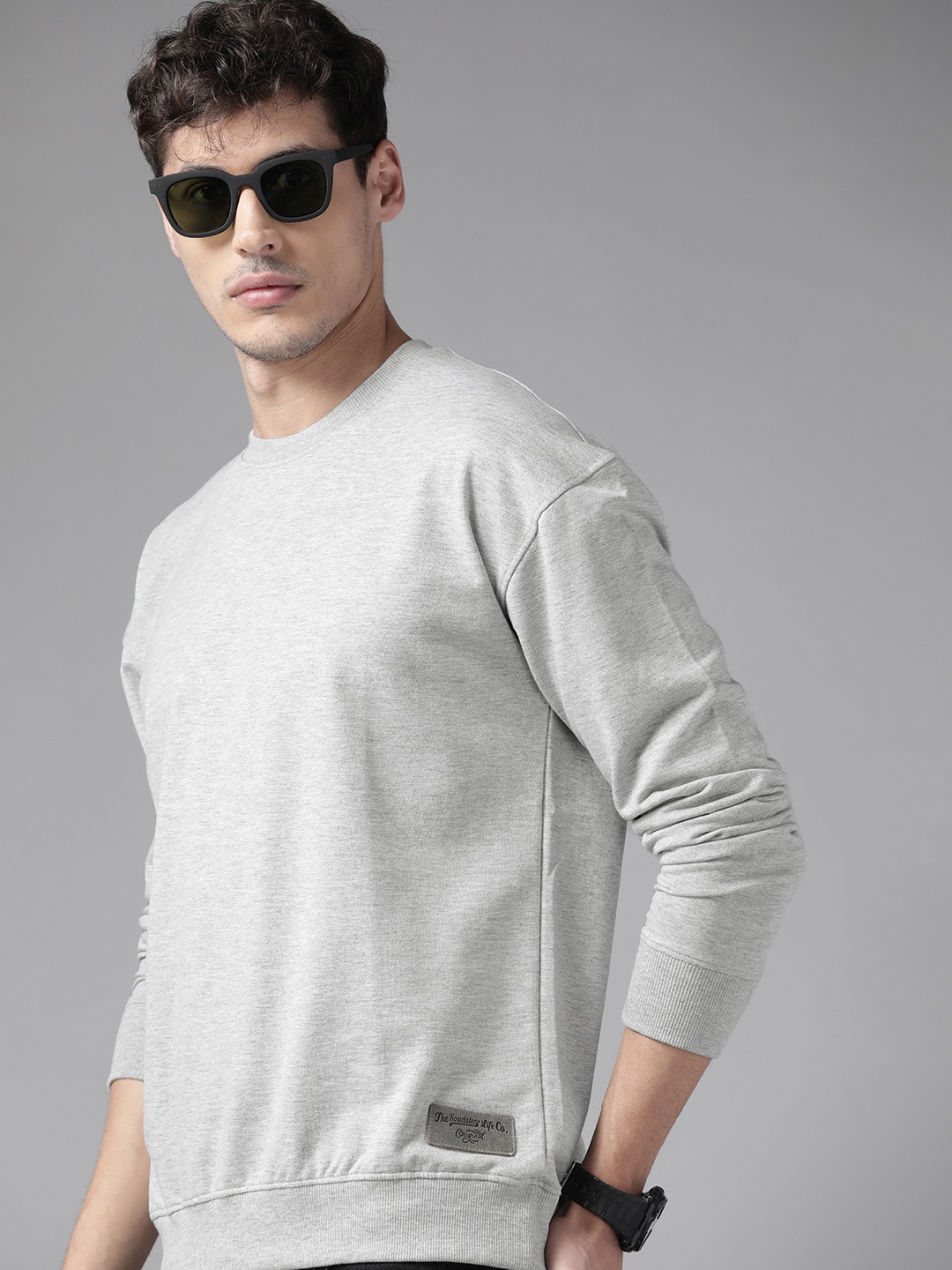 

The Roadster Lifestyle Co Men Grey Melange Solid Relaxed Fit Sweatshirt