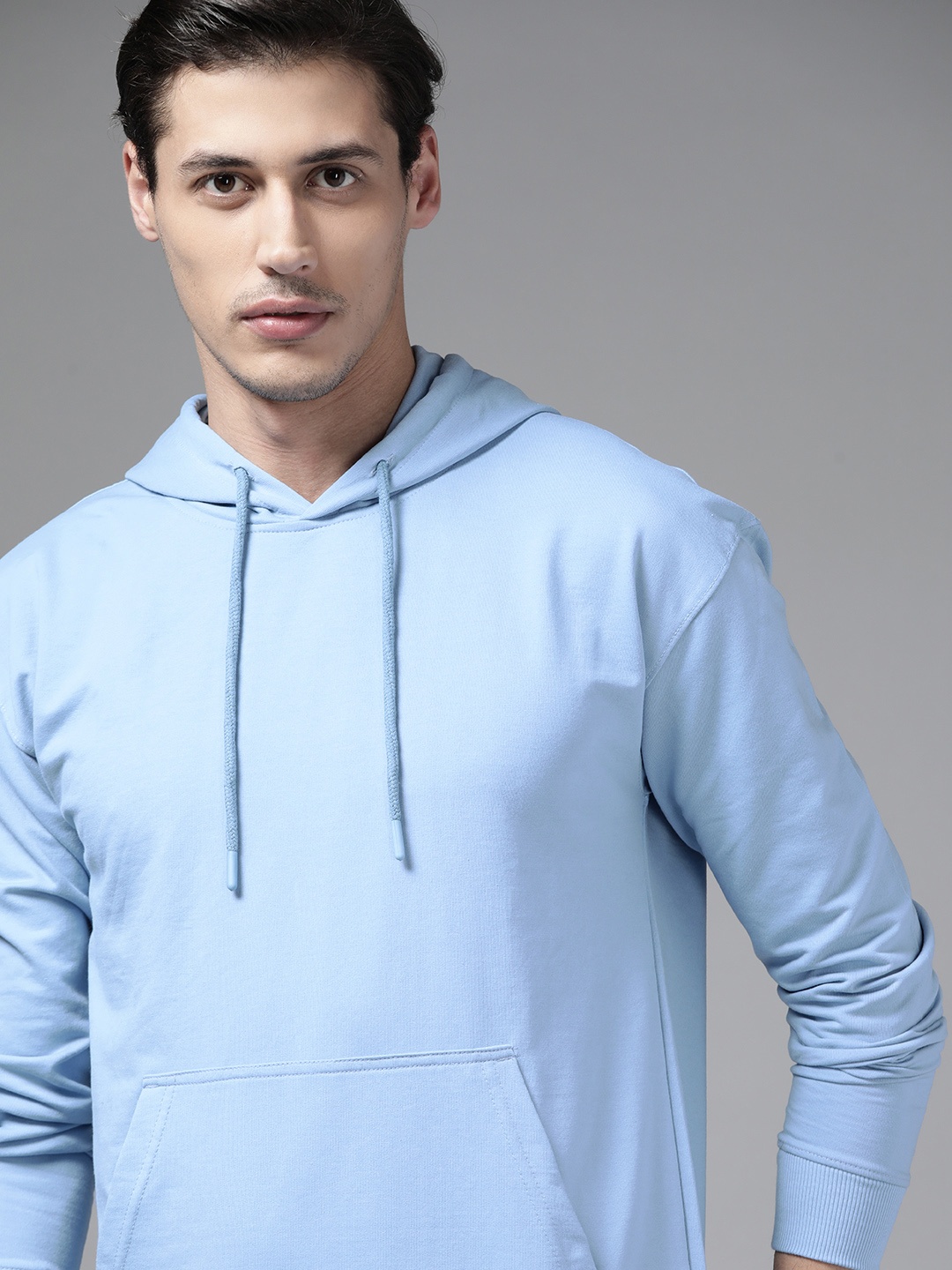 

The Roadster Lifestyle Co Men Blue Solid Hooded Sweatshirt