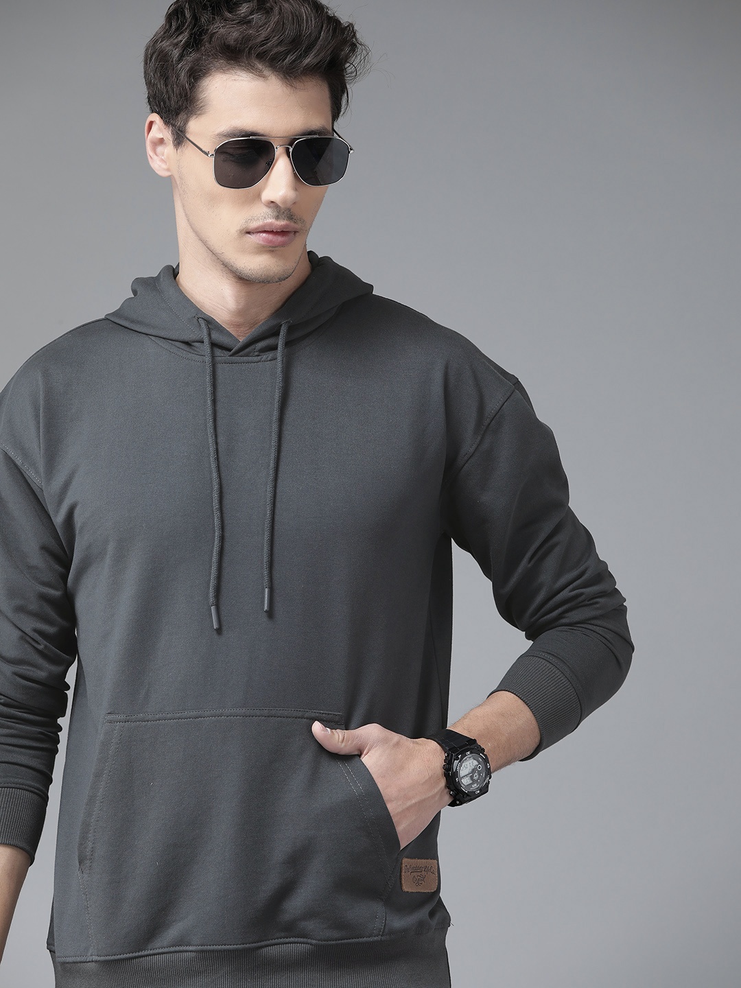

The Roadster Lifestyle Co Men Charcoal Solid Hooded Relaxed Fit Sweatshirt