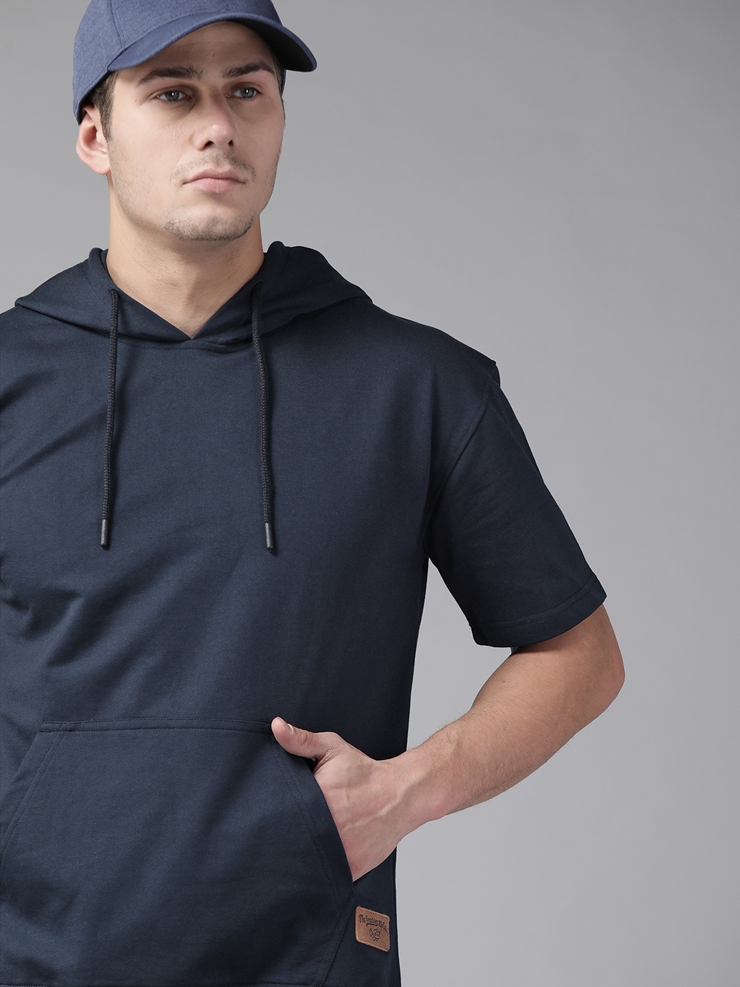 

The Roadster Lifestyle Co Men Navy Blue Solid Hooded Sweatshirt