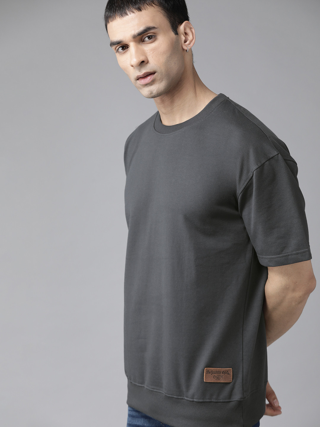 

The Roadster Lifestyle Co Men Charcoal Grey Solid Relaxed Fit Sweatshirt