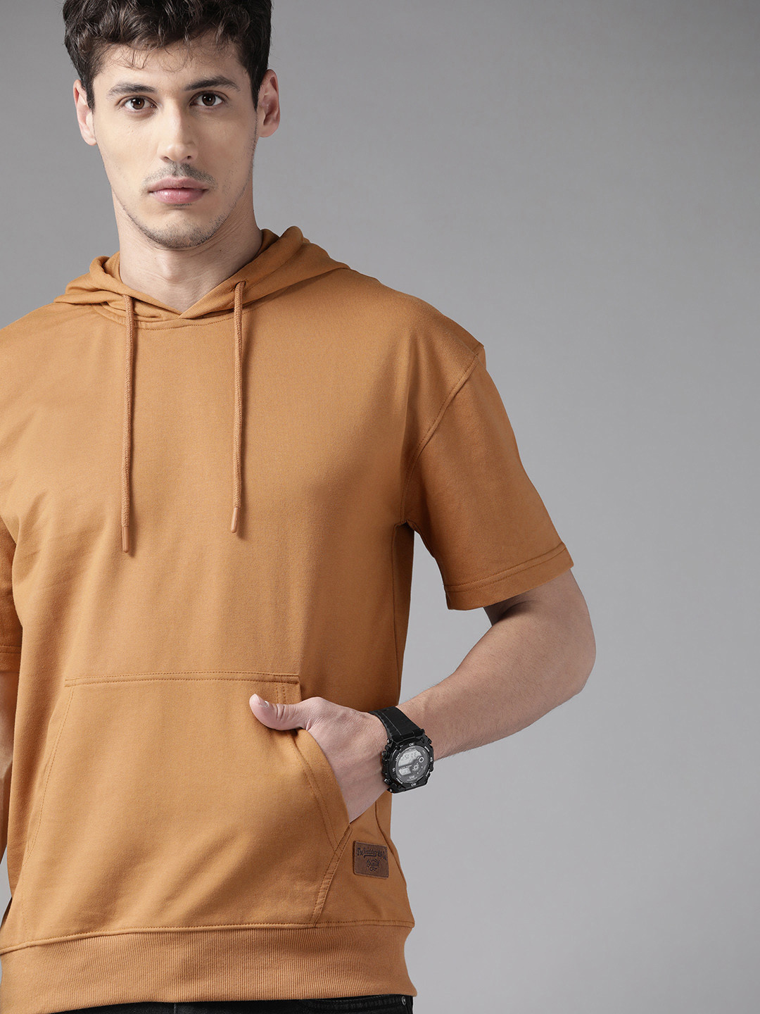 

Roadster Men Brown Solid Hooded Sweatshirt