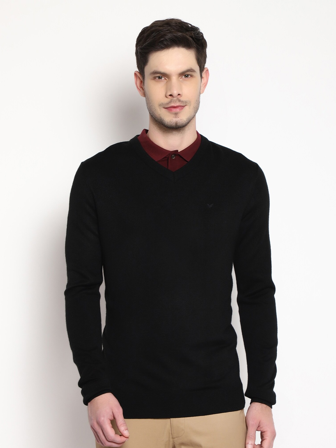 

Blackberrys Men Black Solid Pure Wool Pullover Sweater