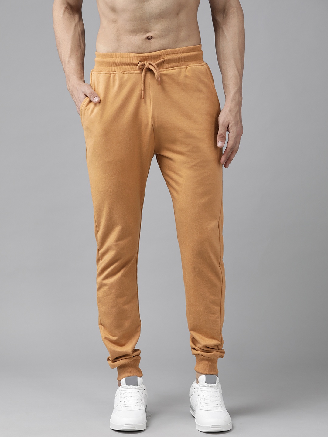 

Roadster Men Brown Solid Knitted Relaxed Fit Joggers
