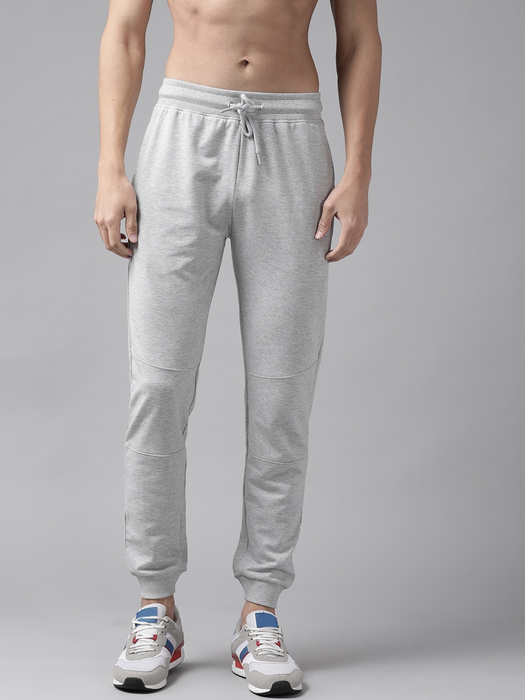 

The Roadster Lifestyle Co Men Grey Melange Solid Knitted Joggers