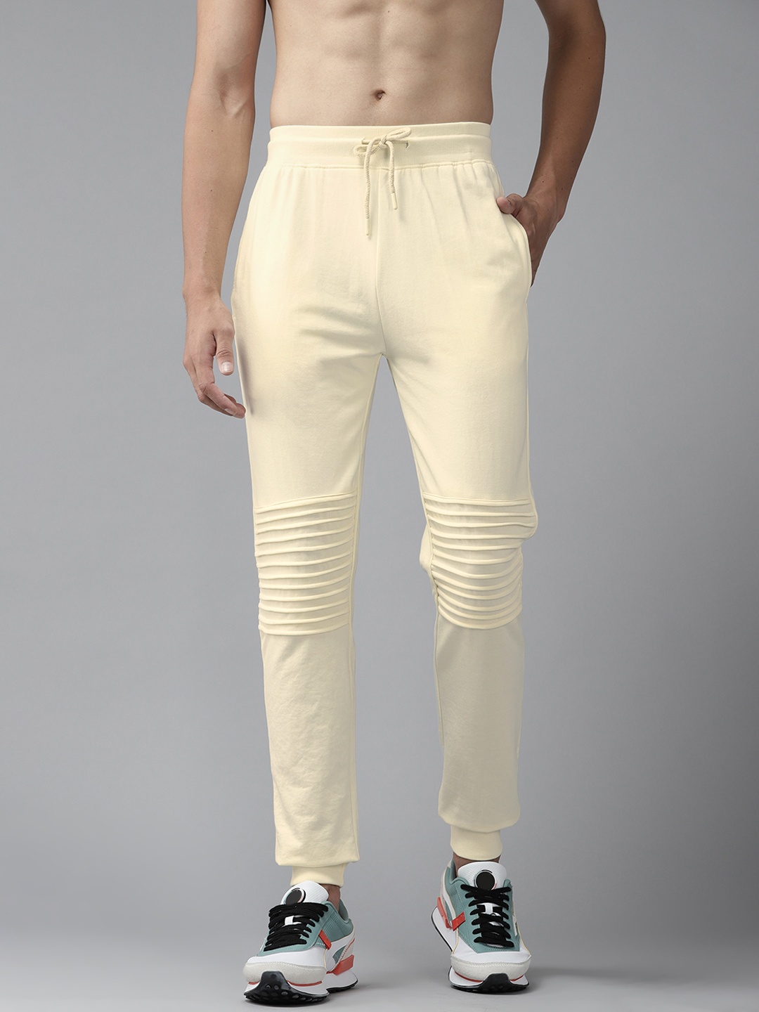 

Roadster Men Cream-Coloured Solid Panelled Relaxed Fit Joggers
