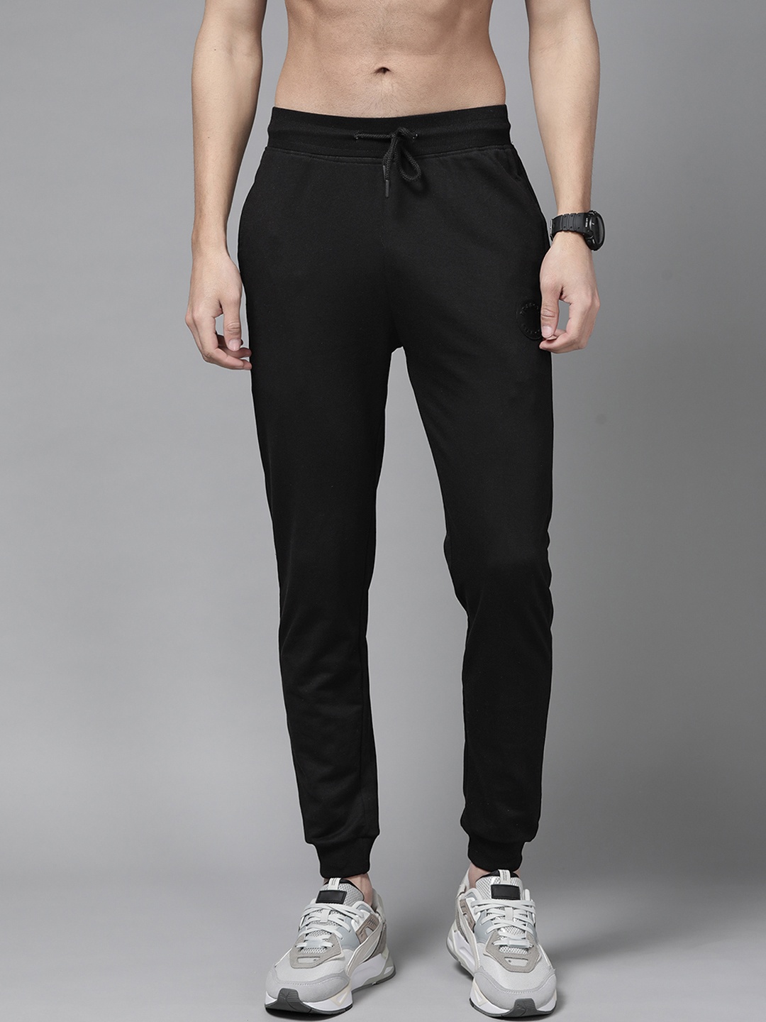 

The Roadster Lifestyle Co Men Black Solid Relaxed Fit Joggers