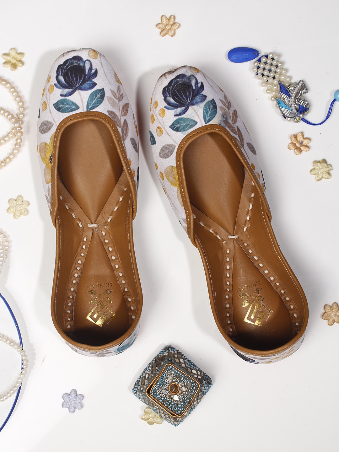 

Sringam Women White Printed Leather Ethnic Mojaris Flats