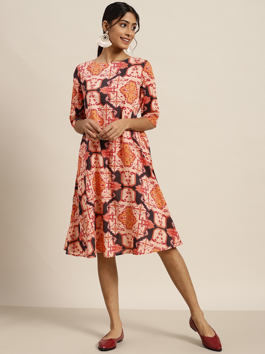 

Sangria Black & Orange Pure Cotton Ethnic Motifs Printed A-Line Dress