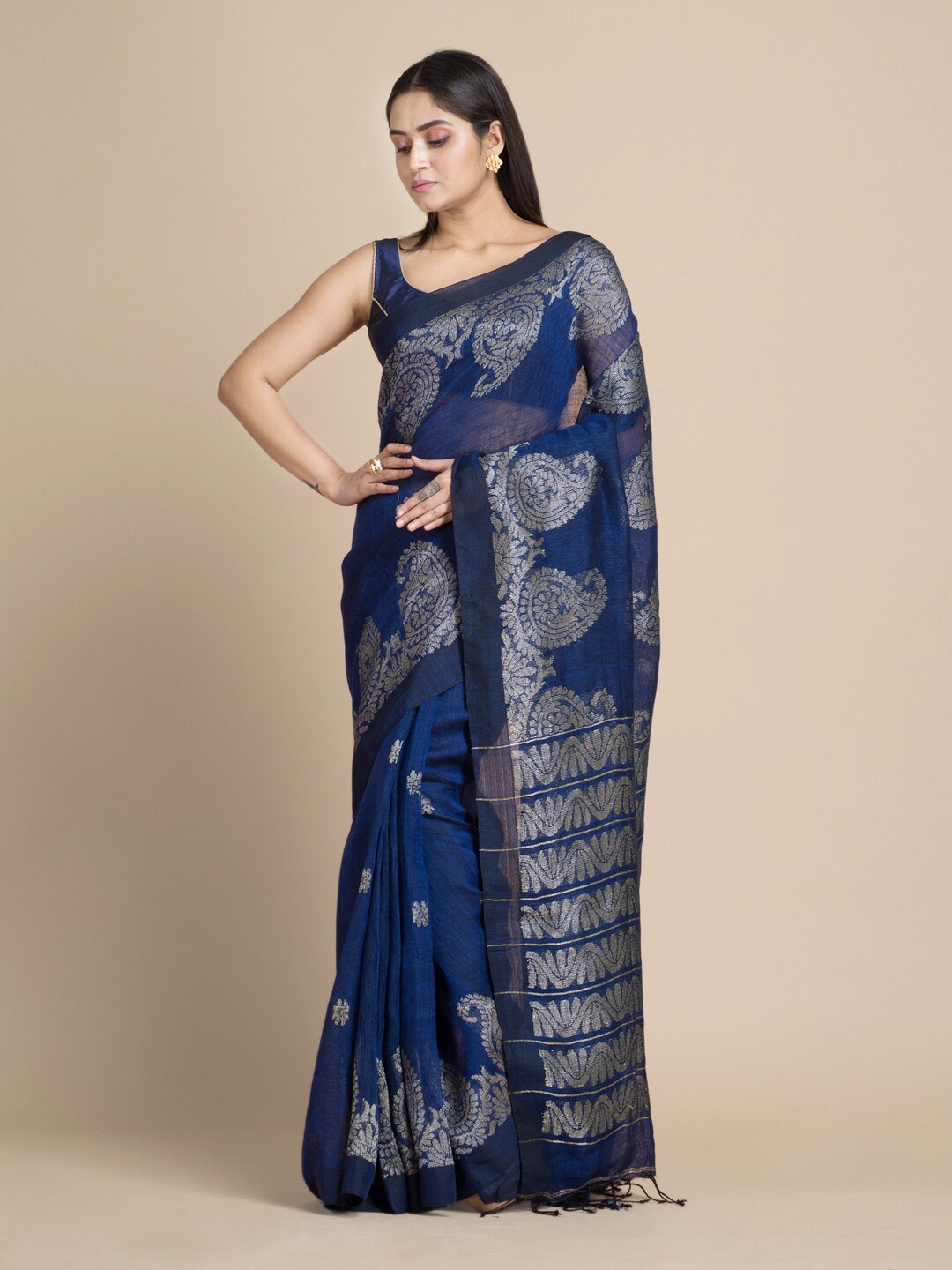 

Mitera Blue & Silver-Toned Ethnic Motifs Zari Pure Linen Saree